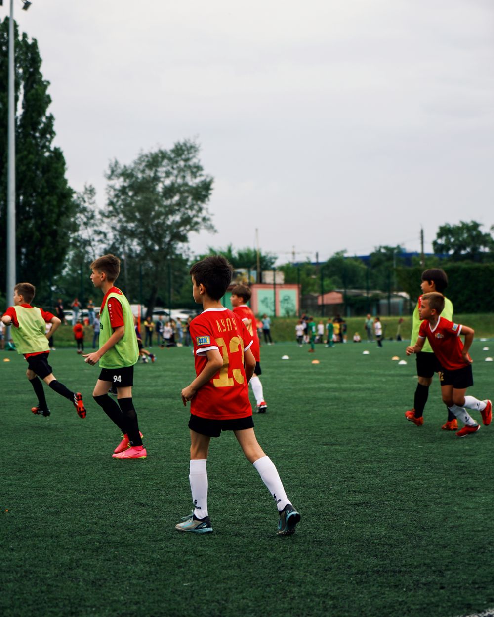 Youth team training session on a green field