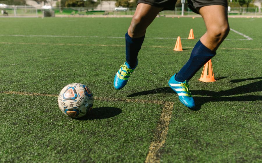 Fast footwork drill around training cones